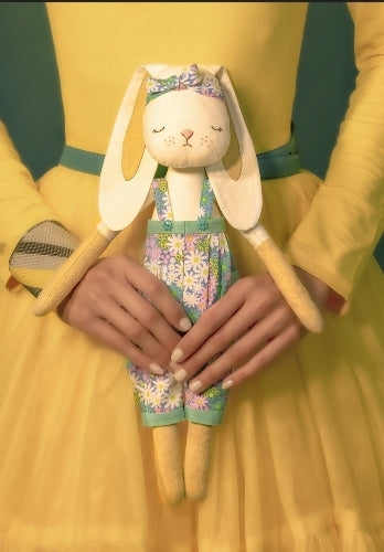 Little Poppy in blue pants with daisies