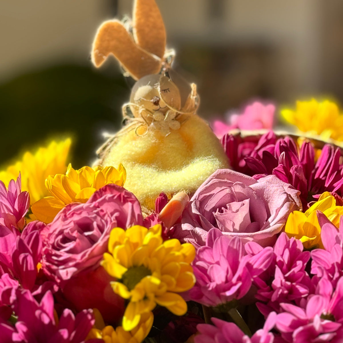 Purple and yellow flowers with Easter bunny.