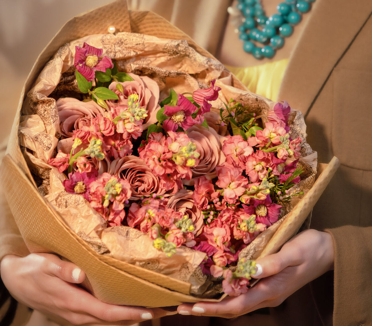 Brown flowers bouquet wrapped in Kraft paper