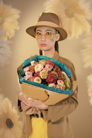 Ranunculus flower bouquet in a girl's arms