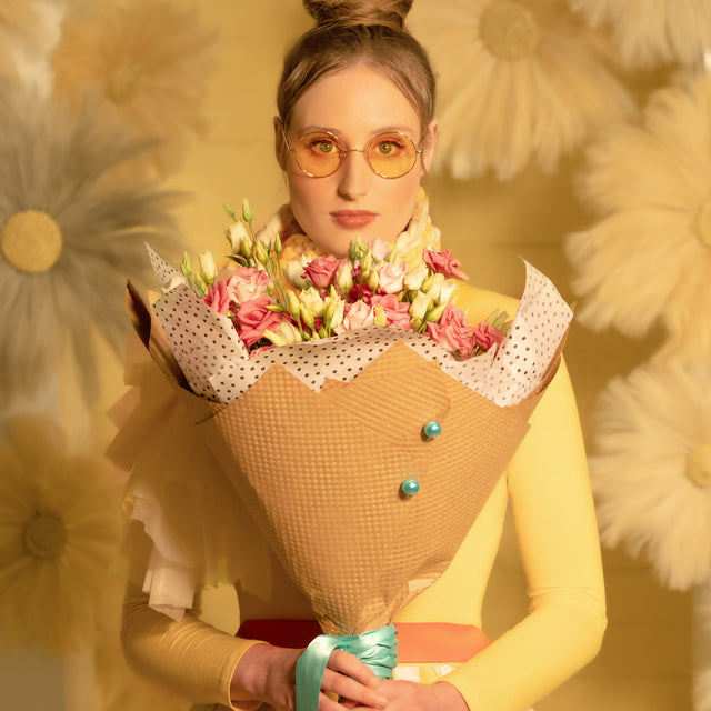 Lisianthus bouquet in a girl's arms