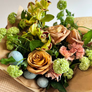 Bouquet with green cymbidium orchids, viburnum.