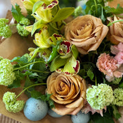 Chic Easter arrangement with cymbidium orchids