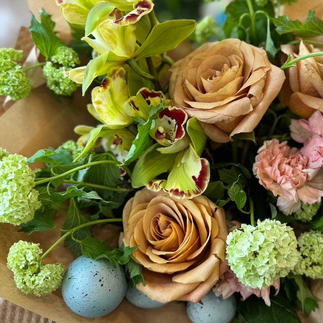 Chic Easter arrangement with cymbidium orchids