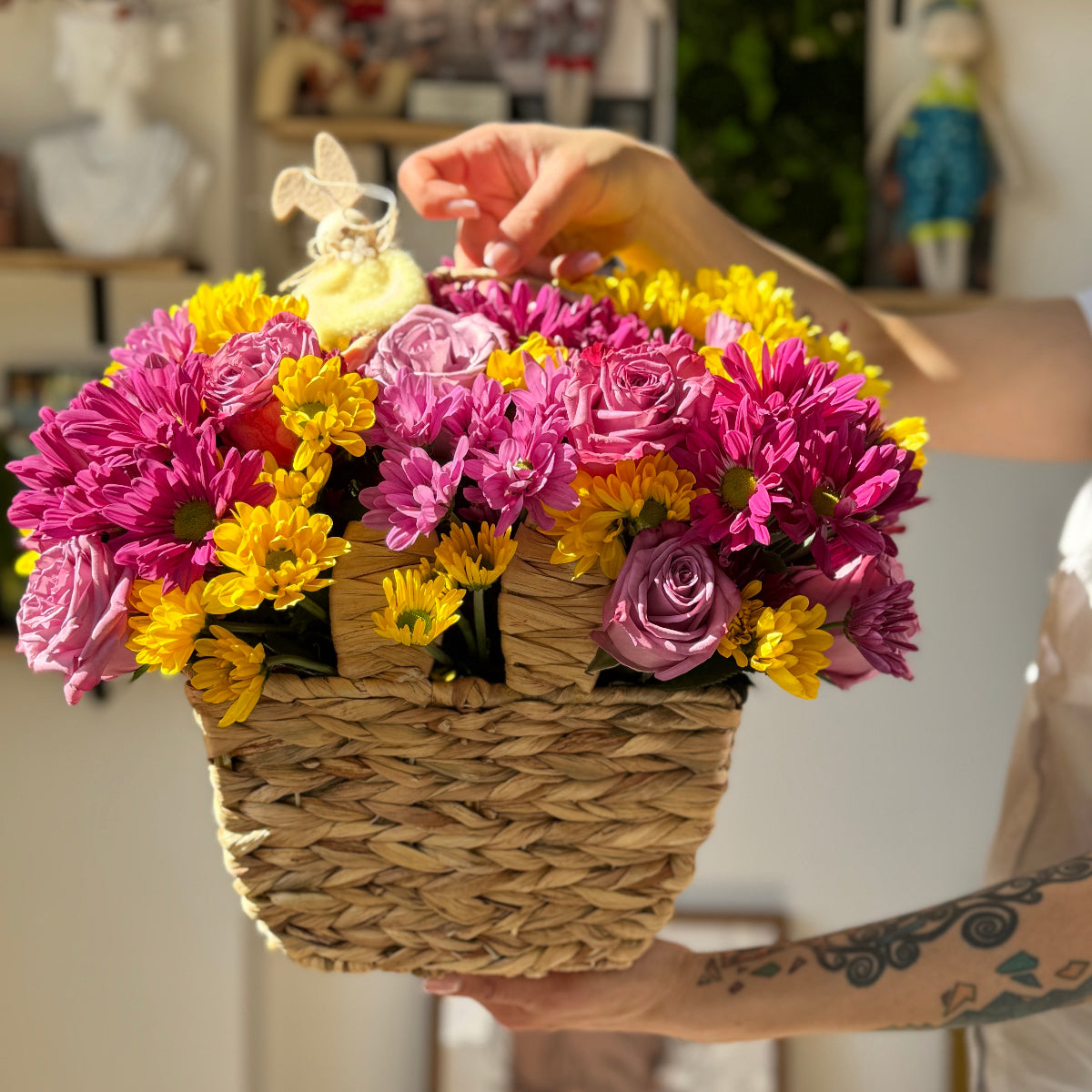 Large basket with easter fresh flowers.