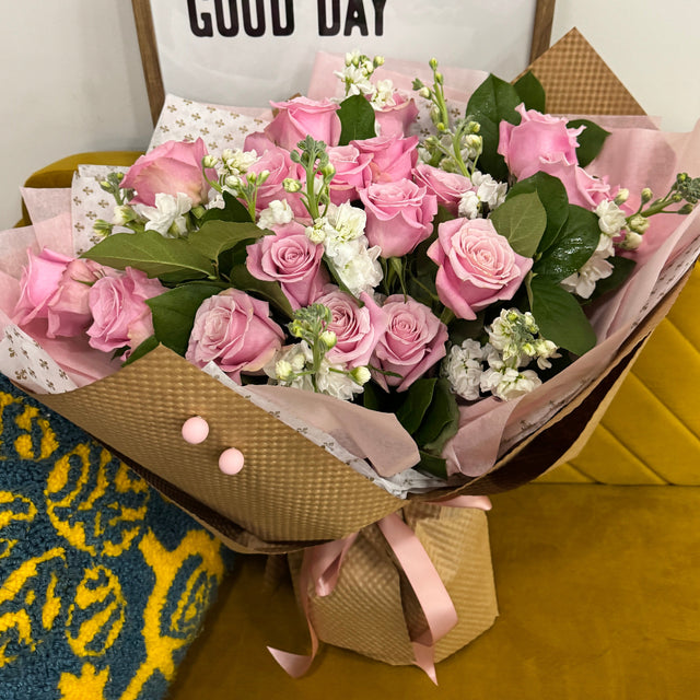 Gorgeous pink rose bouquet with stock flowers.