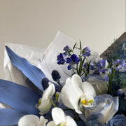 Contemporary flower bouquet in icy blue hues