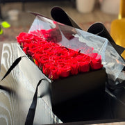 Elegant red rose box arrangement designed for romantic gifting