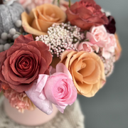 Pink Whisper Centerpiece in a pink clay vase.