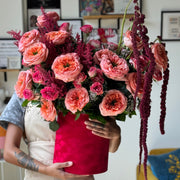 Grand Amour Bouquet with garden roses, Expression roses, spray roses, astilbe, and hanging amaranthus by Flowers’ Cuddles.
