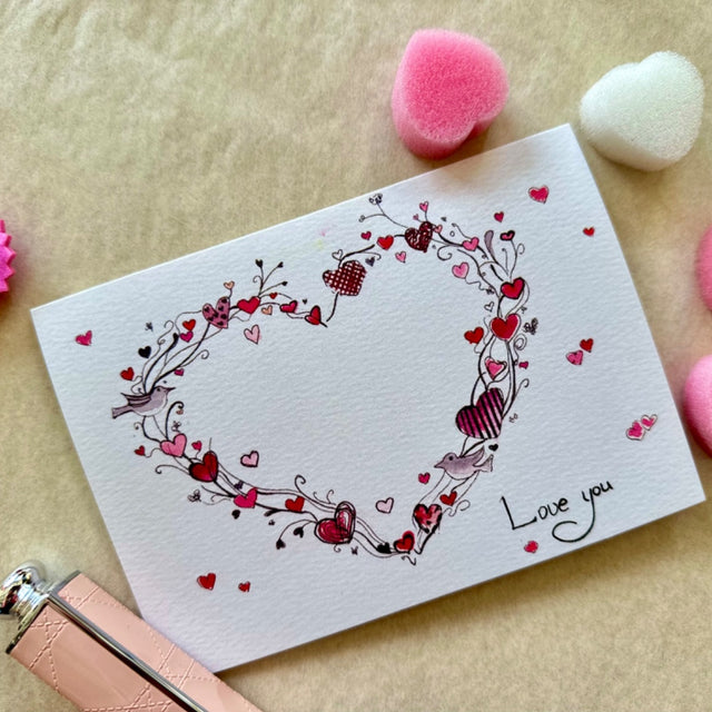 Card with a heart and "Love you" text