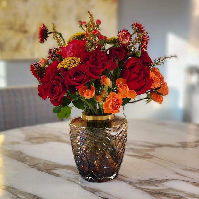 Flower centerpiece chocolate-colored glass vas