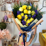 Blue & Gold Cheers Bouquet with yellow roses and bright blue delphinium