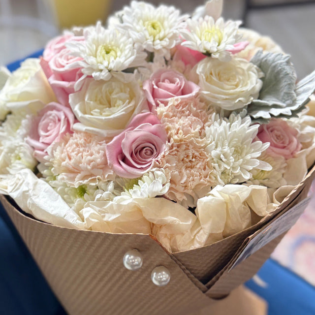 Sugar Rose bouquet with pink and white roses, spray mums, and carnations