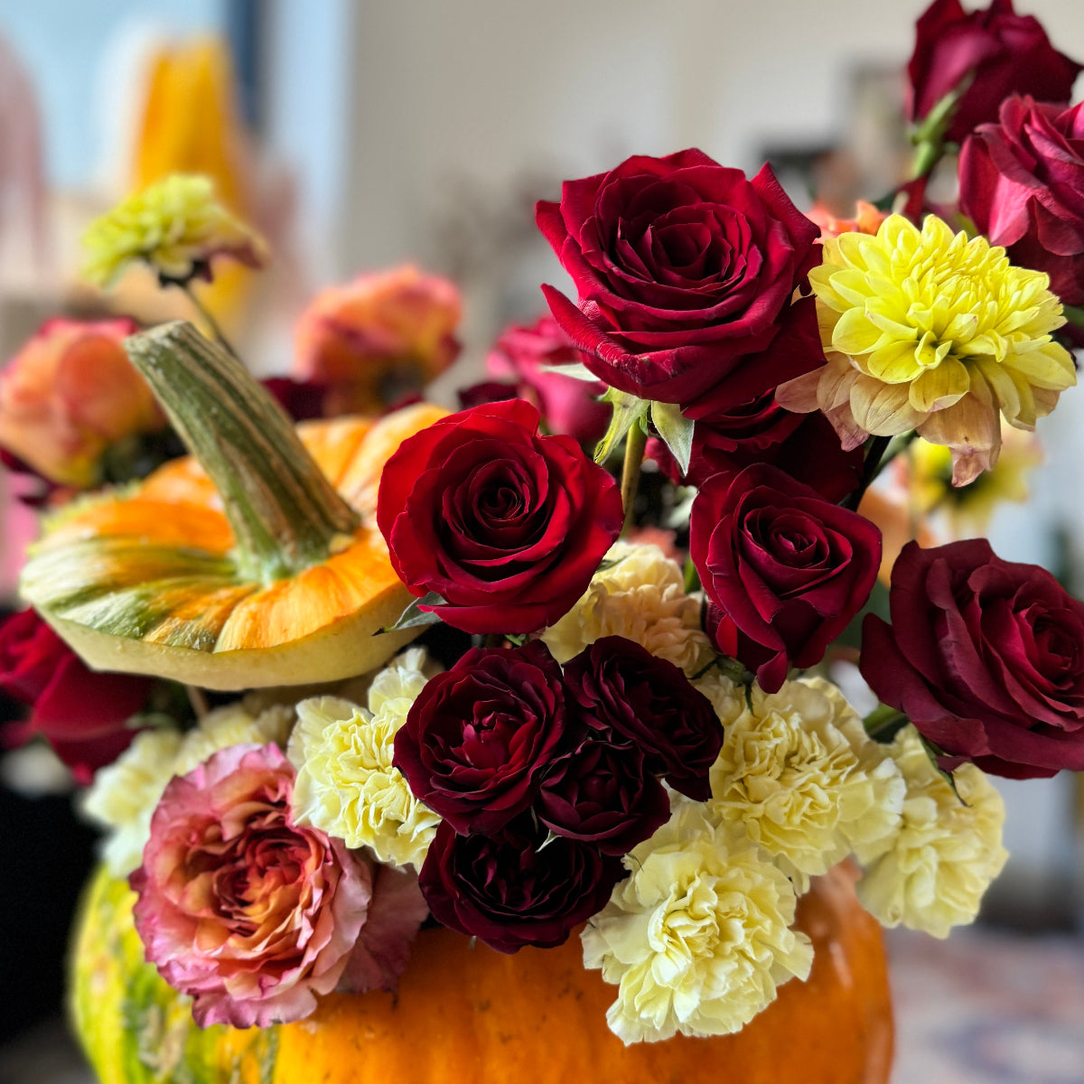 Sustainable floral design created with biodegradable foam and fresh fall flowers.