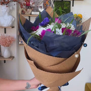 Patriotic floral bouquet in red, white, and blue for 4th of July celebrations