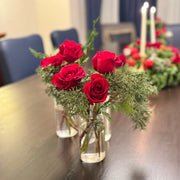 Modern Evergreen Table Centerpiece with coordinated textures and seasonal greenery