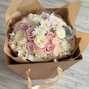 Spray mums and roses floral arrangement in the box