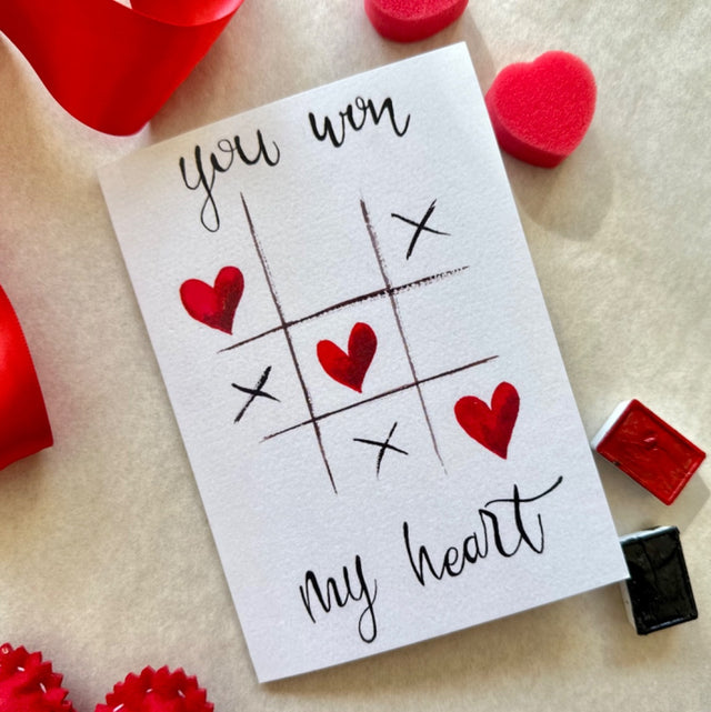 Card with "You won my heart" text